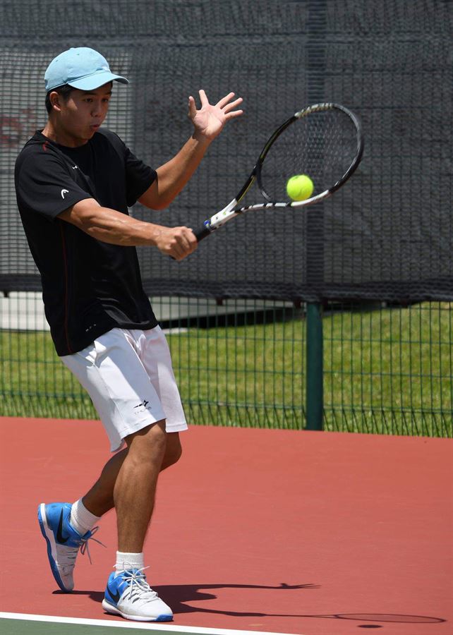 Sherwin Foo hitting a forehand